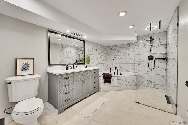 full bathroom featuring shower with separate bathtub, vanity, and toilet