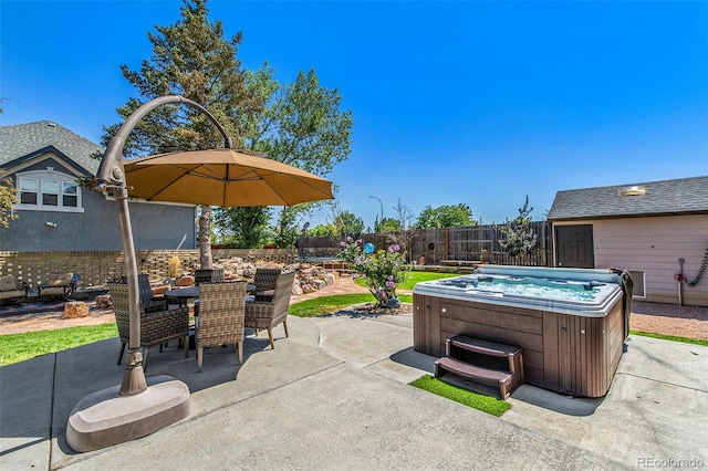 view of patio with a hot tub