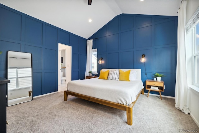 1702 W 66th Ave, Denver, CO 80221 - bedroom featuring vaulted ceiling, carpet, a decorative wall, and ensuite bath