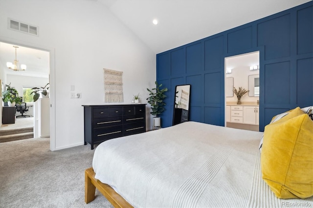 1702 W 66th Ave, Denver, CO 80221 - carpeted bedroom with visible vents, an inviting chandelier, high vaulted ceiling, recessed lighting, and connected bathroom