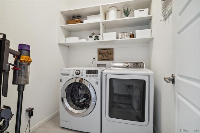 1702 W 66th Ave, Denver, CO 80221 - clothes washing area featuring baseboards, laundry area, and washer and dryer