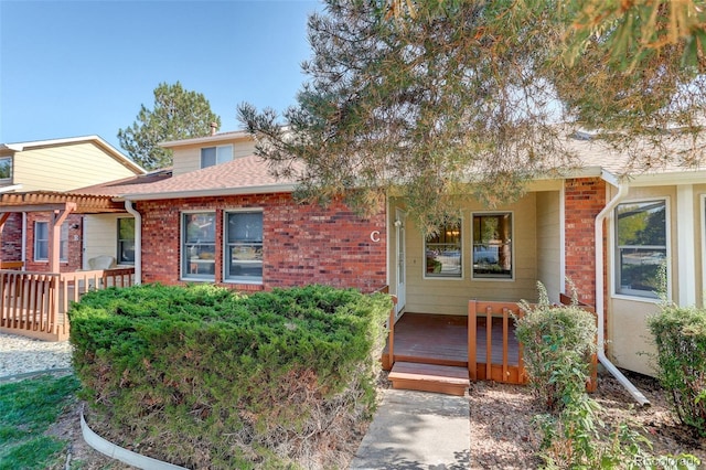 view of front of property featuring a deck