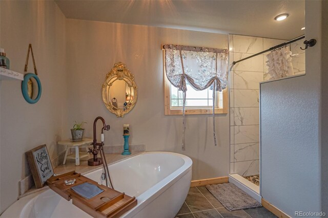 bathroom with plus walk in shower and tile patterned floors