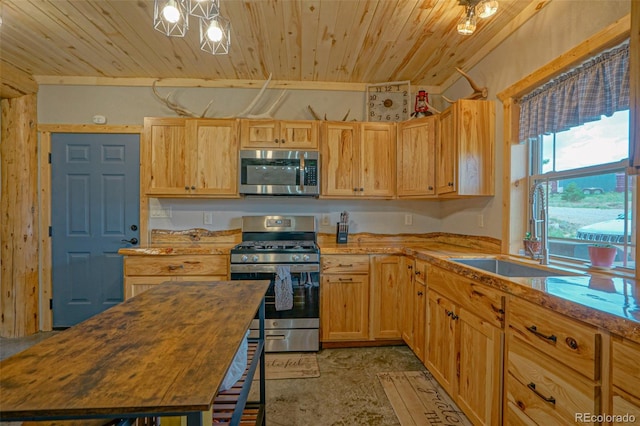 kitchen featuring wood ceiling, sink, appliances with stainless steel finishes, and wood counters