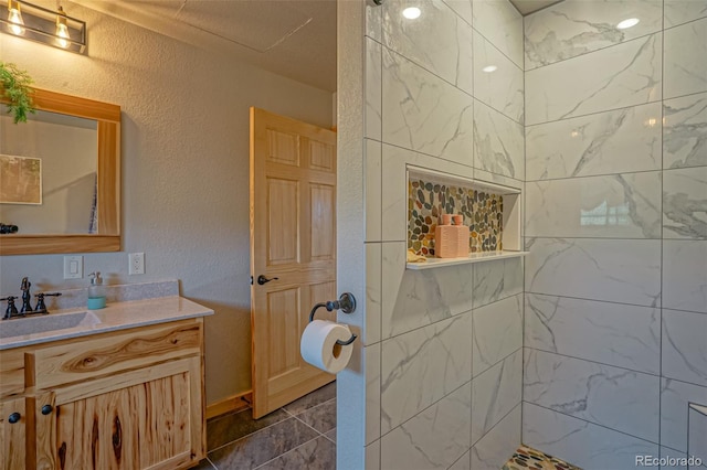 bathroom with vanity and tile patterned floors