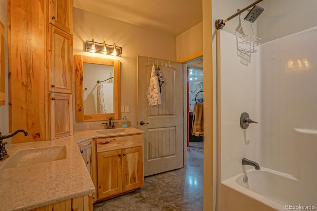 bathroom with vanity and  shower combination