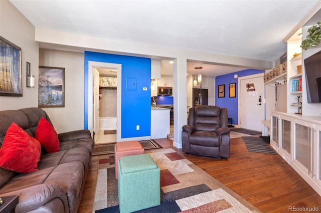 living room with dark wood-type flooring