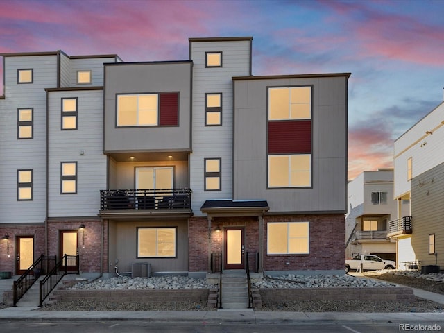 view of front of house with central AC unit