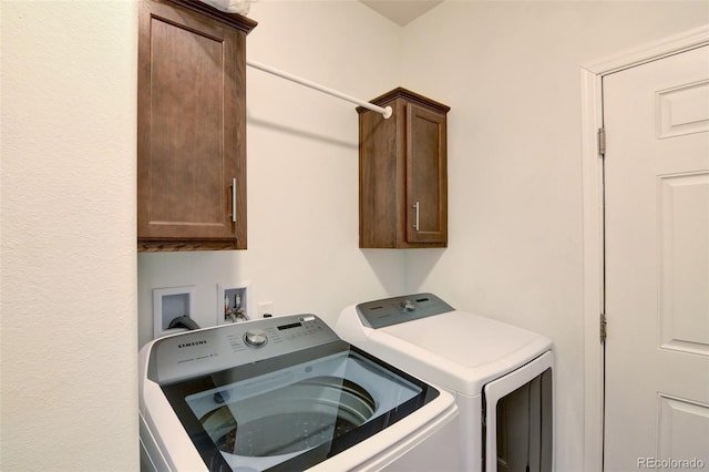 526 Wagon Wheel Rd, Hartsel, CO 80449 - laundry area featuring washing machine and dryer and cabinet space