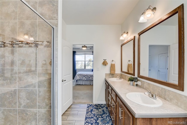 526 Wagon Wheel Rd, Hartsel, CO 80449 - bathroom with a shower stall, double vanity, ensuite bath, and a ceiling fan