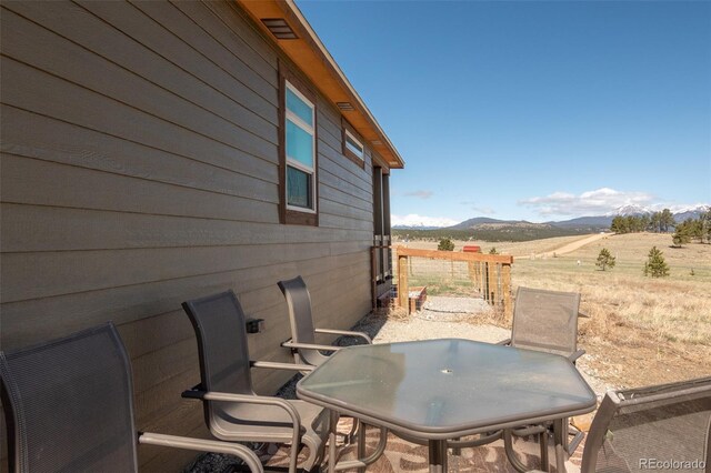 526 Wagon Wheel Rd, Hartsel, CO 80449 - view of patio / terrace with a mountain view and a view of rural / pastoral area