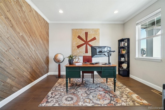 home office with dark wood-style floors, wooden walls, baseboards, and ornamental molding