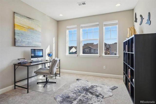 office space featuring visible vents, baseboards, and carpet flooring