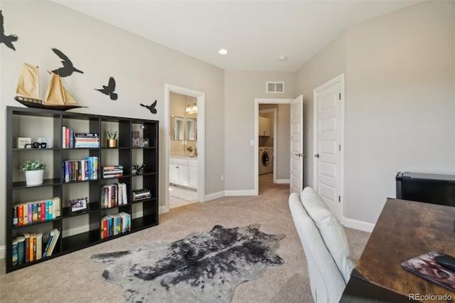 carpeted home office featuring visible vents, recessed lighting, washer / clothes dryer, and baseboards