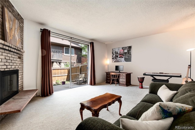 carpeted living room featuring a fireplace and a textured ceiling