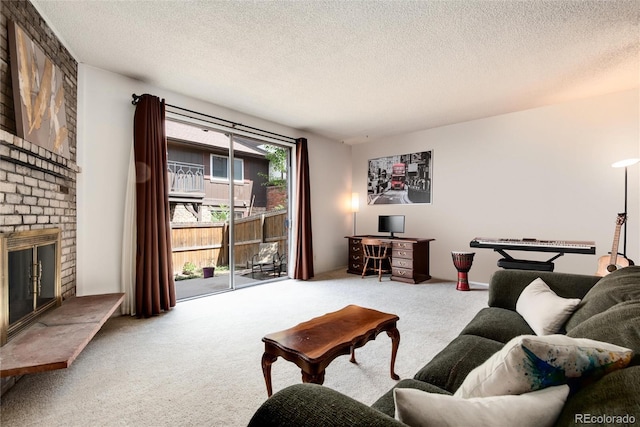 carpeted living room with a brick fireplace and a textured ceiling