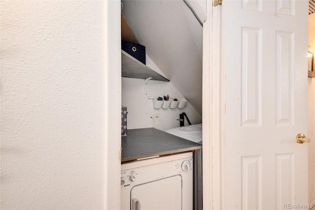 laundry room featuring washer / dryer