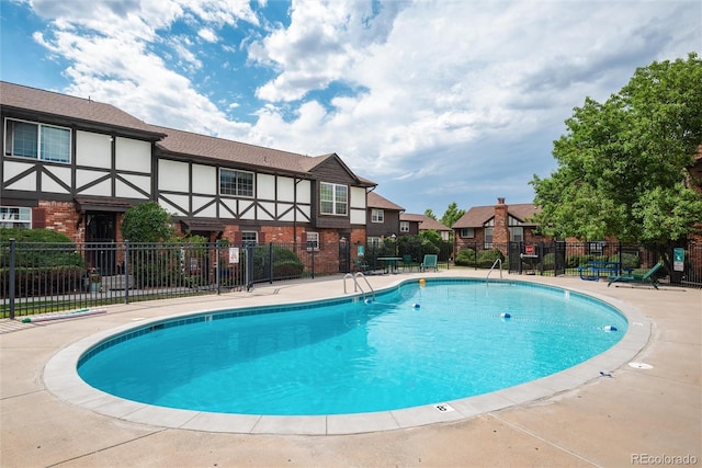 view of pool with a patio