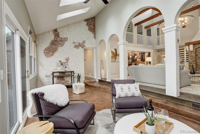 interior space featuring visible vents, arched walkways, stairway, ornate columns, and high vaulted ceiling