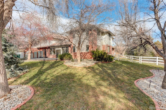 view of yard featuring fence