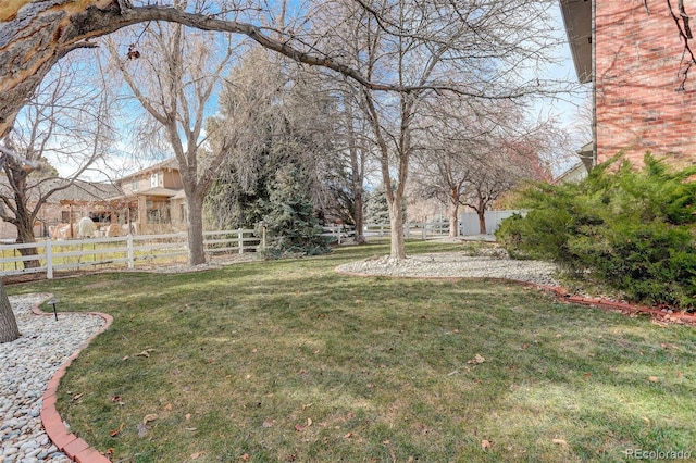 view of yard with fence