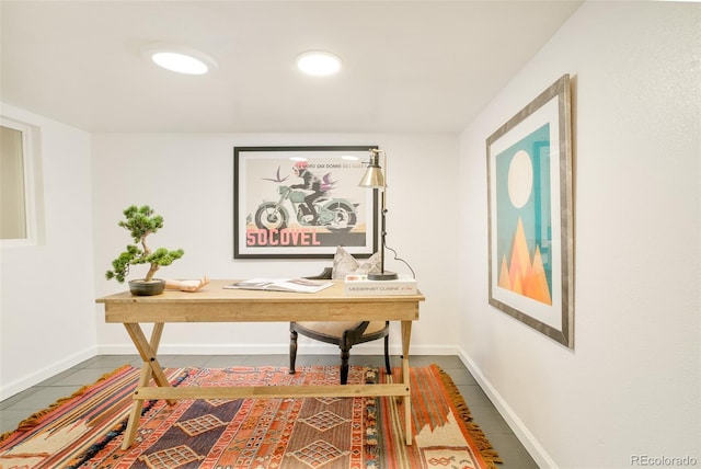 tiled office space with baseboards