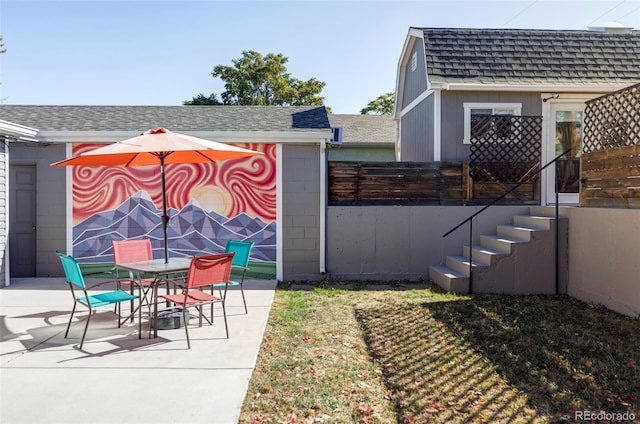 view of patio / terrace with fence