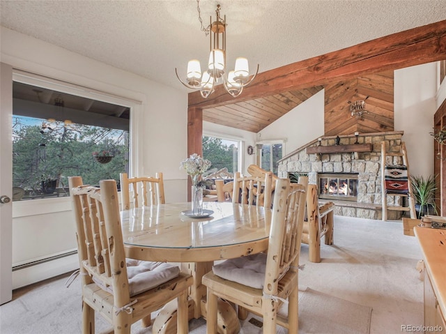 carpeted dining area with a textured ceiling, a fireplace, an inviting chandelier, baseboard heating, and vaulted ceiling with beams