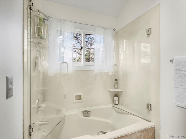 full bath featuring combined bath / shower with glass door