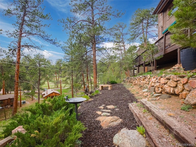 view of yard with a deck