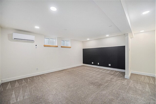 1111 Monroe St, Denver, CO 80206 - below grade area featuring a wall mounted AC, carpet flooring, baseboards, and recessed lighting