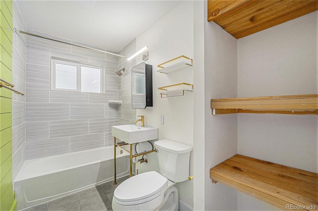 1111 Monroe St, Denver, CO 80206 - bathroom featuring toilet, tile patterned flooring, shower / tub combination, and a sink