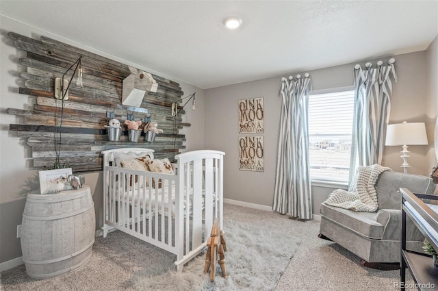 18150 Coppermallow Trl, Parker, CO 80134 - carpeted bedroom featuring baseboards and a crib