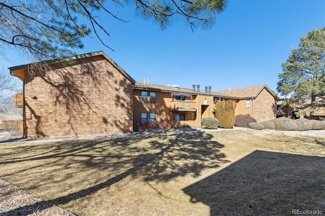 back of house with a balcony