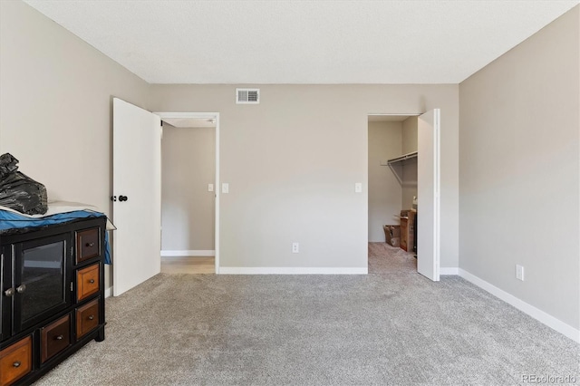 bedroom with light carpet