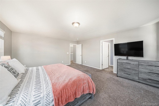 carpeted bedroom with baseboards