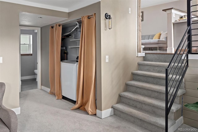 8764 W 95th Ave, Broomfield, CO 80021 - staircase featuring washer / clothes dryer, baseboards, and carpet