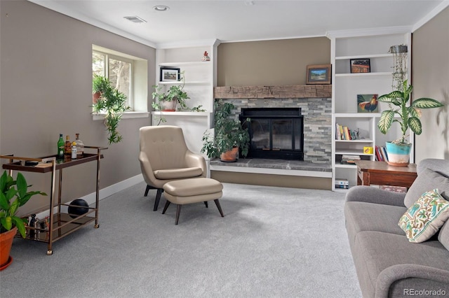 8764 W 95th Ave, Broomfield, CO 80021 - carpeted living room with a fireplace, ornamental molding, and baseboards