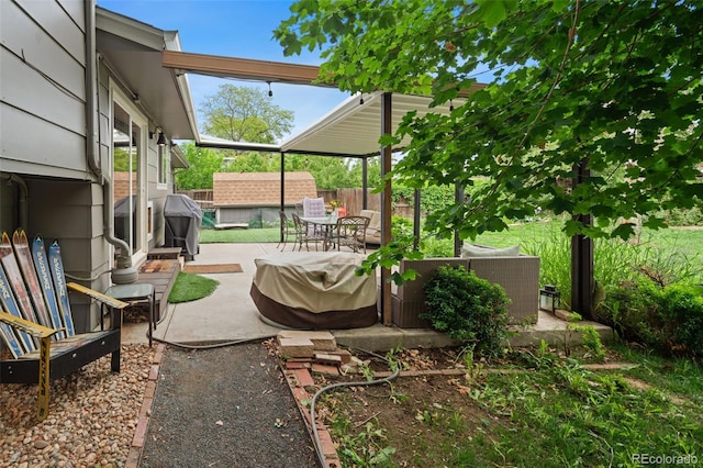 8764 W 95th Ave, Broomfield, CO 80021 - view of patio / terrace featuring outdoor dining space and area for grilling