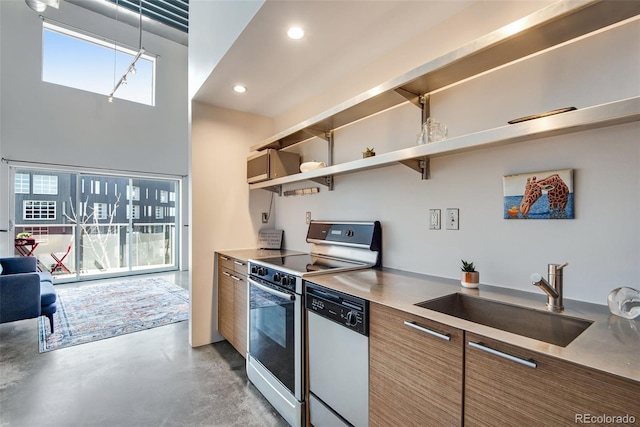kitchen with concrete floors, open shelves, dishwasher, a sink, and electric stove