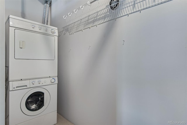 laundry room with laundry area and stacked washer and clothes dryer