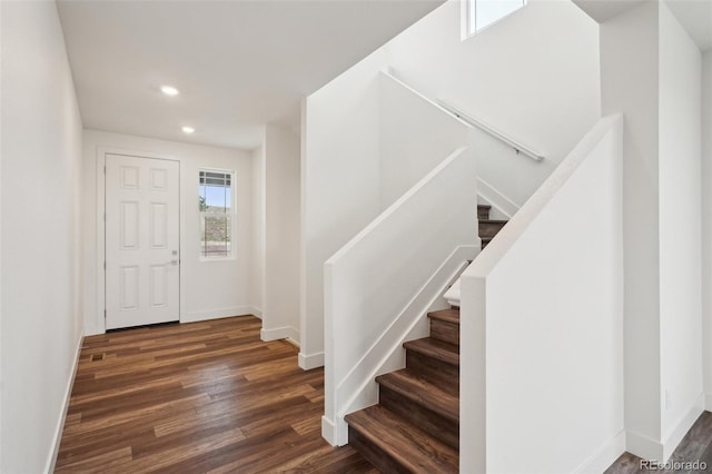 foyer entrance featuring recessed lighting, baseboards, and wood finished floors