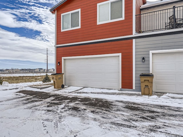 view of snow covered garage