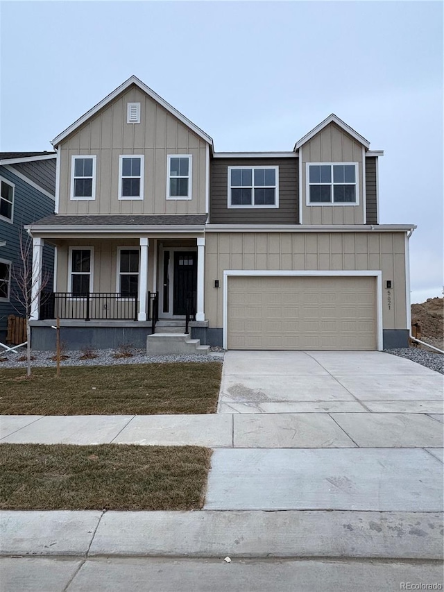 view of front of property with a garage