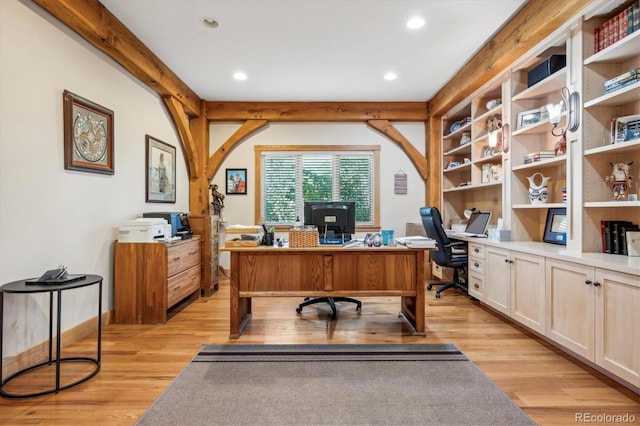 office area with light wood finished floors and recessed lighting