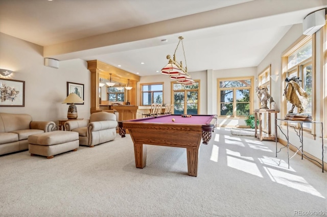 recreation room featuring carpet flooring, billiards, ornate columns, and a healthy amount of sunlight