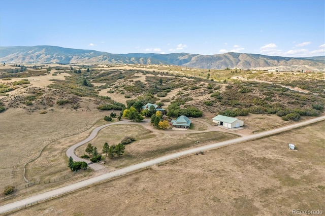 aerial view featuring a mountain view and a rural view