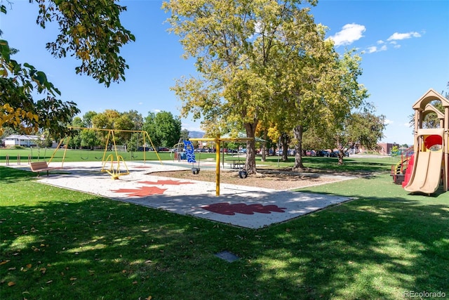 view of playground with a yard