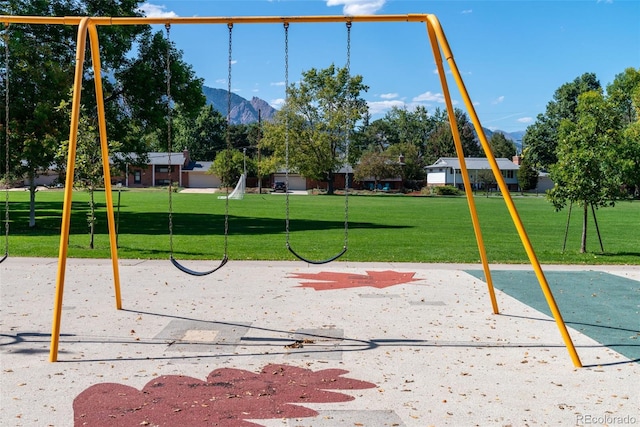 view of playground featuring a mountain view