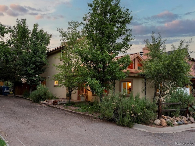 109 Bear Creek Ln, Morrison, CO 80465 - view of property hidden behind natural elements with stucco siding